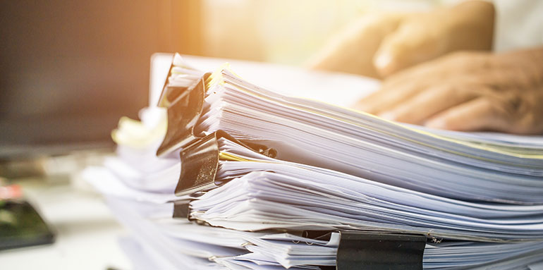 Folders Piled Up On Eachother